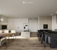 Open-plan living and dining area with modern furniture, a large wooden dining table, white chairs, a grey sofa, a black kitchen island, and sleek kitchen appliances.