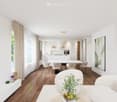 Modern living room with a white sofa, coffee table, dining area with chairs and table, pendant lights, large screen, and decorative plants.