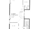 Floor plan of a building with labeled rooms including reception, WC, and staircase. Dimensions and room heights are indicated.