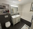 Modern bathroom with a white sink, mirror, toilet, bathtub, shelves, and a towel hanging on the wall.