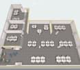 Office floor plan with multiple workstations, desks, chairs, and small meeting rooms.