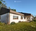detached house, white exterior, black roof, several windows, ground level, no visible garage