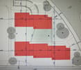 Floor plan showing multiple rooms labeled 2A, 2B, 2C, 2D, 2E, and TG, with dimensions and circular cutouts representing possible openings or fixtures.