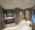 Modern bathroom with a large bathtub, double sink, mirrored cabinet, and built-in storage. Features recessed lighting and large windows.