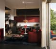 Modern living room with a red accent wall, a large TV, a sofa with red cushions, a coffee table, a kitchen area with dark cabinets and a white island, and a small balcony with outdoor seating.