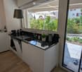 {"type": "Kitchen", "objects": ["sink", "faucet", "oven", "coffee maker", "bottle", "faucet", "faucet", "faucet", "faucet", "faucet", "faucet", "faucet", "faucet", "faucet", "faucet", "faucet", "faucet", "faucet", "faucet", "faucet", "faucet", "faucet", "