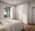 Modern bedroom with a large bed, white bedding, wooden floor, built-in wardrobe, and large windows with white curtains.
