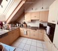{"type": "Kitchen", "objects": ["sink", "faucet", "dishwasher", "oven", "cabinets", "blender", "fridge", "oven", "cupboard", "faucet", "oven", "oven", "oven", "oven", "oven", "oven", "oven", "oven", "oven", "oven", "oven", "oven", "oven", "oven", "oven",