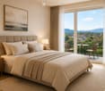 Modern bedroom with a large bed, nightstands, lamps, a balcony with outdoor seating, and a scenic mountain view.