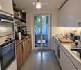 {"type": "Kitchen", "objects": ["oven", "coffee maker", "blender", "cutting board", "cup", "faucet", "sink", "oven", "cupboard", "bottle", "cup", "oven", "oven", "oven", "oven", "oven", "oven", "oven", "oven", "oven", "oven", "oven", "oven", "oven", "oven