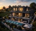 Modern two-story house with large glass windows, multiple terraces, swimming pool, outdoor seating, and well-lit landscaping.