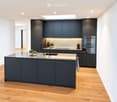 {"type": "Kitchen", "objects": ["kitchen island", "sink", "faucet", "oven", "cabinets", "faucet", "faucet", "oven", "faucet", "oven", "faucet", "oven", "faucet", "oven", "faucet", "oven", "faucet", "oven", "faucet", "oven", "faucet", "oven", "faucet", "ov