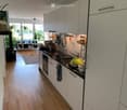 {"type": "Kitchen", "objects": ["sink", "faucet", "oven", "cabinets", "fridge", "oven", "oven", "oven", "oven", "oven", "oven", "oven", "oven", "oven", "oven", "oven", "oven", "oven", "oven", "oven", "oven", "oven", "oven", "oven", "oven", "oven", "oven",