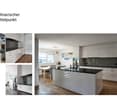 Modern kitchen with white cabinetry, black countertop, large window with city view, dining area with table and chairs.