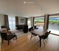 {"visible_features": ["View"], "type": "Furnished Room", "objects": ["sofa", "chair", "table", "chair", "table", "chair", "chair", "chair", "chair", "chair", "chair", "chair", "chair", "chair", "chair", "chair", "chair", "chair", "chair", "chair", "chair"