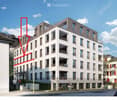Modern multi-story apartment building with balconies and large windows, surrounded by urban environment.