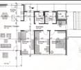 Floor plan of a 3-bedroom apartment with kitchen, living/dining area, bathroom, shower, hallway, and elevator.