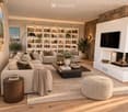 Modern living room with a stone fireplace, sectional sofa, coffee table, armchairs, ottoman, bookshelf, and decorative items.