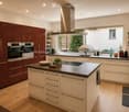 {"type": "Kitchen", "objects": ["oven", "microwave", "fridge", "sink", "faucet", "fridge", "oven", "cupboard", "cupboard", "cupboard", "cupboard", "cupboard", "cupboard", "cupboard", "cupboard", "cupboard", "cupboard", "cupboard", "cupboard", "cupboard",