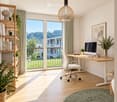 Bright, modern home office with large windows and a balcony view, featuring a white ergonomic chair, wooden desk, computer setup, and decorative plants.