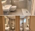 Modern bathroom with beige tiles, a white sink, toilet, and shower area. Features include a built-in shelf with a small plant, a towel rack, and a sleek faucet design.