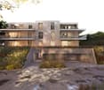 Modern two-story house with a raised ground floor, large windows, balconies, and a landscaped garden area.