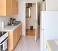{"type": "Kitchen", "objects": ["refrigerator", "oven", "sink", "cabinets", "faucet", "paper towel holder", "oven mitt", "oven mitt", "oven mitt", "oven mitt", "oven mitt", "oven mitt", "oven mitt", "oven mitt", "oven mitt", "oven mitt", "oven mitt", "ove