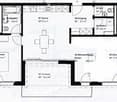 Floor plan showing a 2-bedroom apartment with a kitchen, living/dining area, bathroom, and terrace.