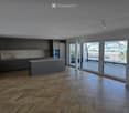 Modern kitchen with grey cabinets, a central island, and large windows offering a scenic view of the landscape.