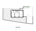 Layout of a basement level showing a kitchen area, utility room, storage space, and parking area.