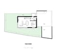 Floor plan of a ground floor showing a living area, dining area, kitchen, bathroom, and garage.