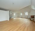 empty room, wooden floor, white walls, spiral staircase, fireplace, windows