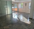 empty room, marble floor, glass sliding doors, balcony, windows with white curtains