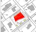 Floor plan with multiple buildings and lots, including a central red-highlighted area