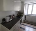 {"type": "Kitchen", "objects": ["oven", "fridge", "sink", "faucet", "cupboard", "bottle", "cup", "fridge", "oven", "bottle", "cupboard", "cupboard", "cupboard", "cupboard", "cupboard", "cupboard", "cupboard", "cupboard", "cupboard", "cupboard", "cupboard"