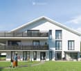 Modern two-story house with white exterior, large windows, and balconies on both levels. The house features a spacious lawn and patio area with outdoor furniture.