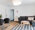 modern apartment, sofa, coffee table, dining table, chairs, wooden floor, lamps, indoor plant, white walls