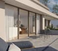 Balcony with outdoor furniture, glass sliding doors, open view to the landscape