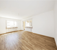 Empty room, hardwood floors, large windows, large doors, white walls