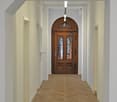 wooden floor, white walls, arched wooden door, hallway