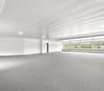 empty office room, white walls, grey carpet, large windows with view to outside, fire extinguisher