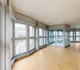 large windows, wooden floor, white walls, modern design