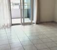 empty room, sliding glass doors, balcony, tiled floor, white curtains