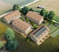 Four houses, red roof tiles, wooden fences, solar panels, large parking area, surrounded by greenery