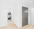empty room with washer and dryer