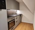 microwave, oven, sink with faucet, dishwasher