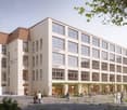 Multi-story educational building, glass windows, green rooftop, multiple entrances, outdoor seating area