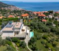 Modern house with swimming pool, solar panels, elevated position, sea view