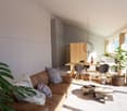 Spacious living room with large windows, wooden dining table and chairs, brown sofa, potted plant, and decorative lighting fixture