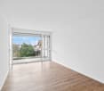 empty room, white walls, wooden floor, sliding glass doors, balcony